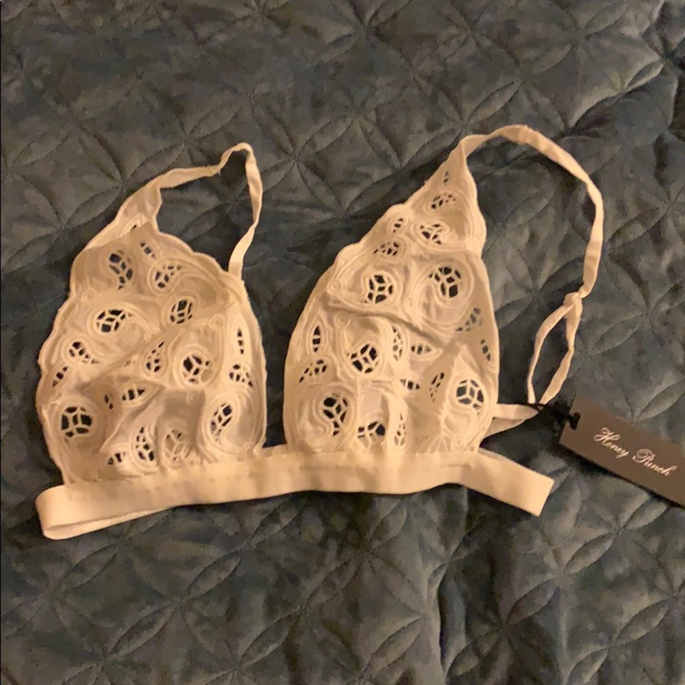 Brand new white cutout bralettes